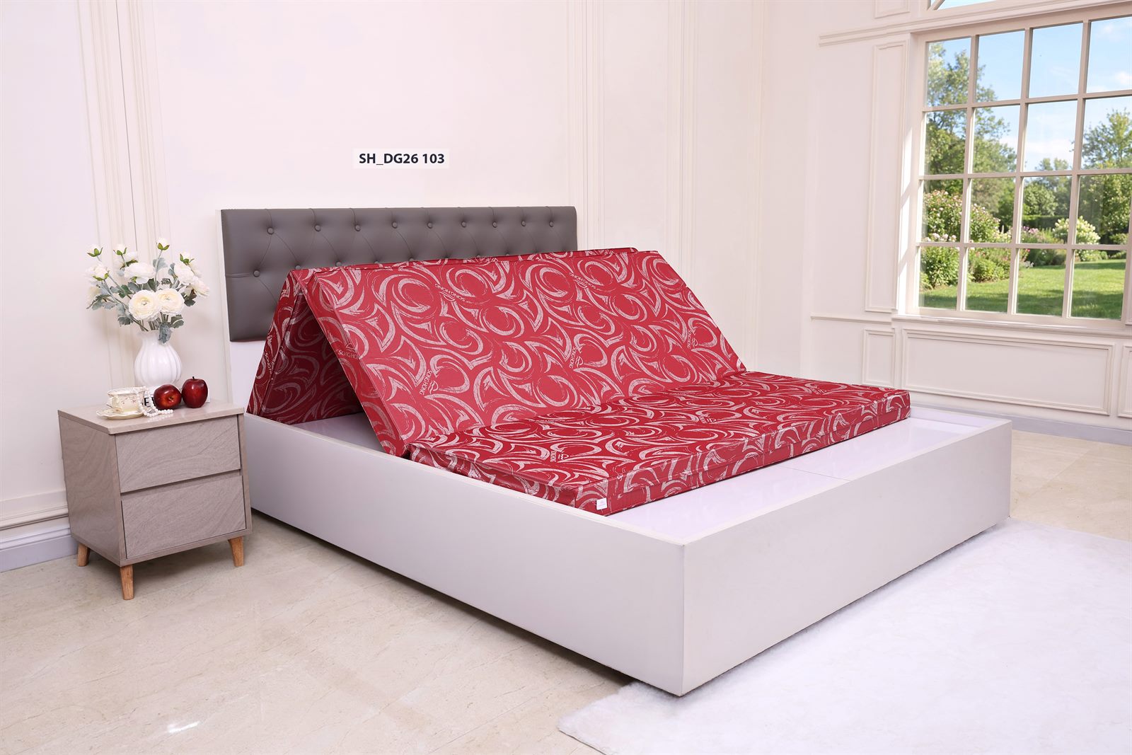 Đệm gấm Sông Hồng màu đỏ đô mã SH_DG26 103, hoa văn xoáy lớn, đang mở gấp trên giường